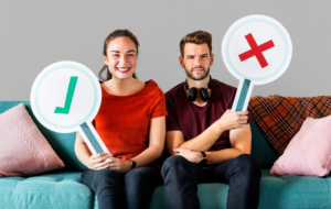 Holding vote icon sitting on a couch