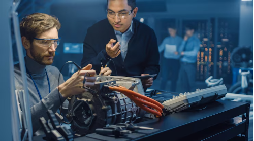A-group-of-men-working-on-a-machine